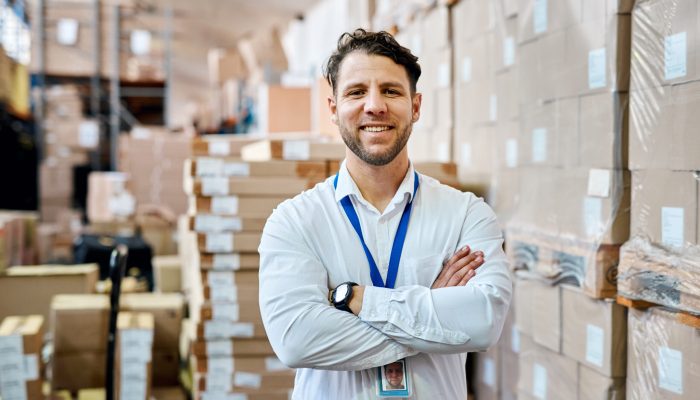Warehouse, stock management and logistics man portrait of a retail shipping analyst working. Factory distribution maintenance, industry worker and success of a businessman happy about company growth